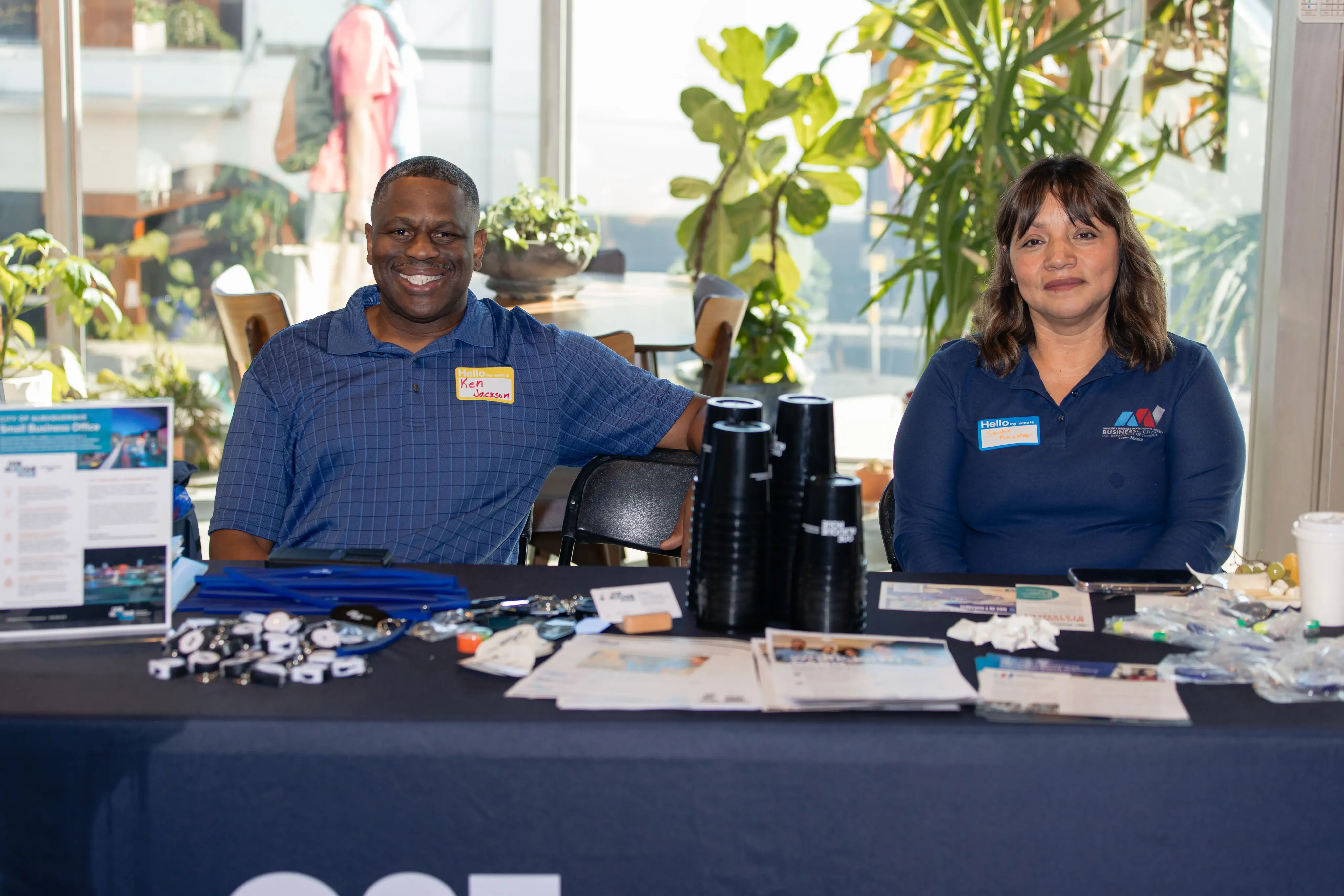 Vendor booth representatives Ken and colleague at TechFest 2024 expo area